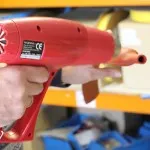 A length of heat shrink tubing recovering onto a cable termination.